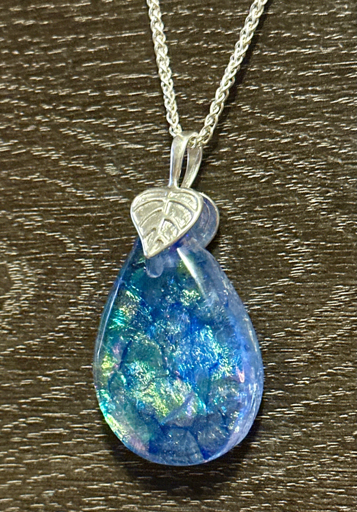 Hand etched and fused opalescent purple multicolor dichroic glass pendant with sterling silver bail and wheat chain.