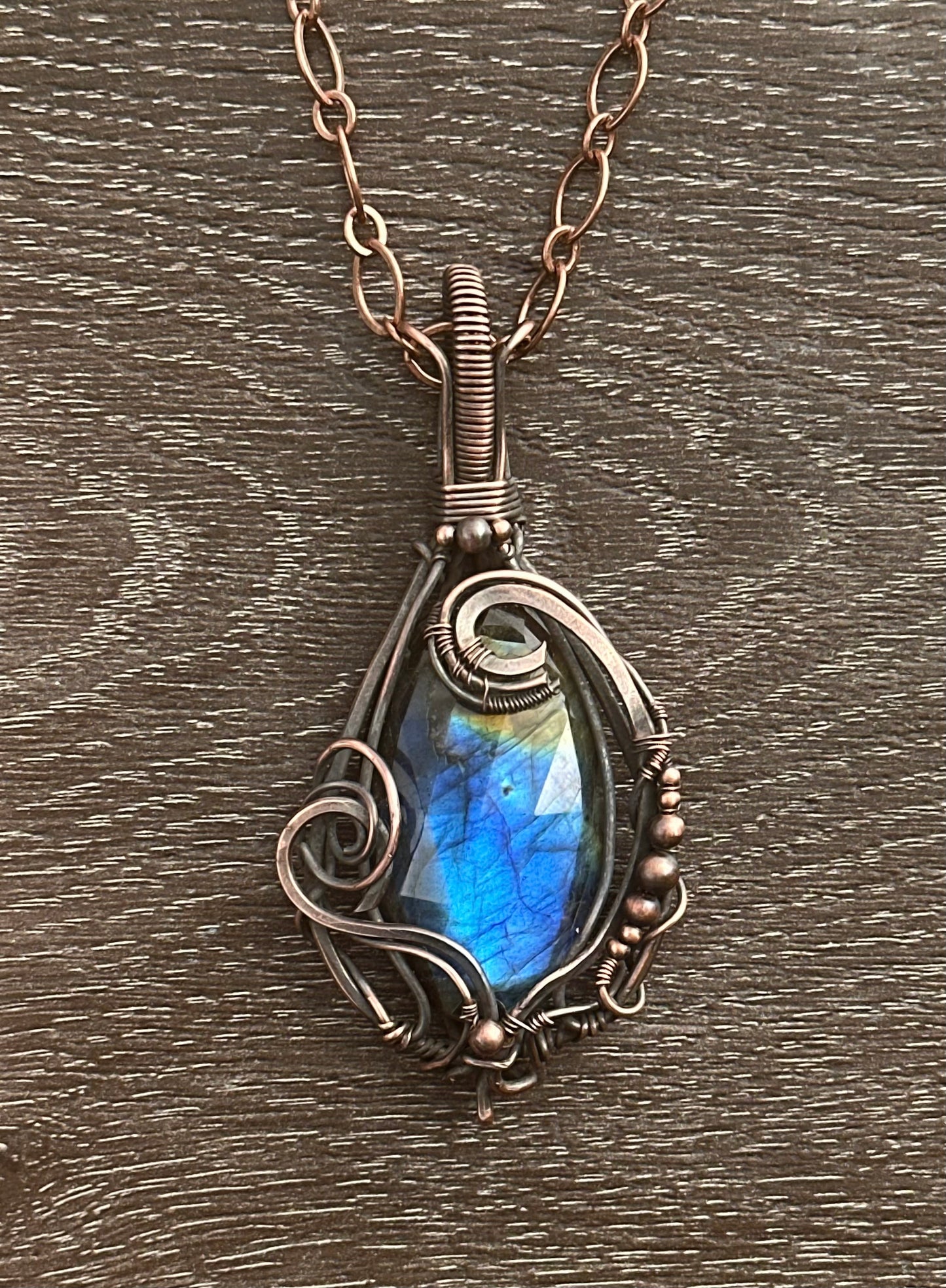 Blue-to-amber labradorite copper wrapped pendant necklace