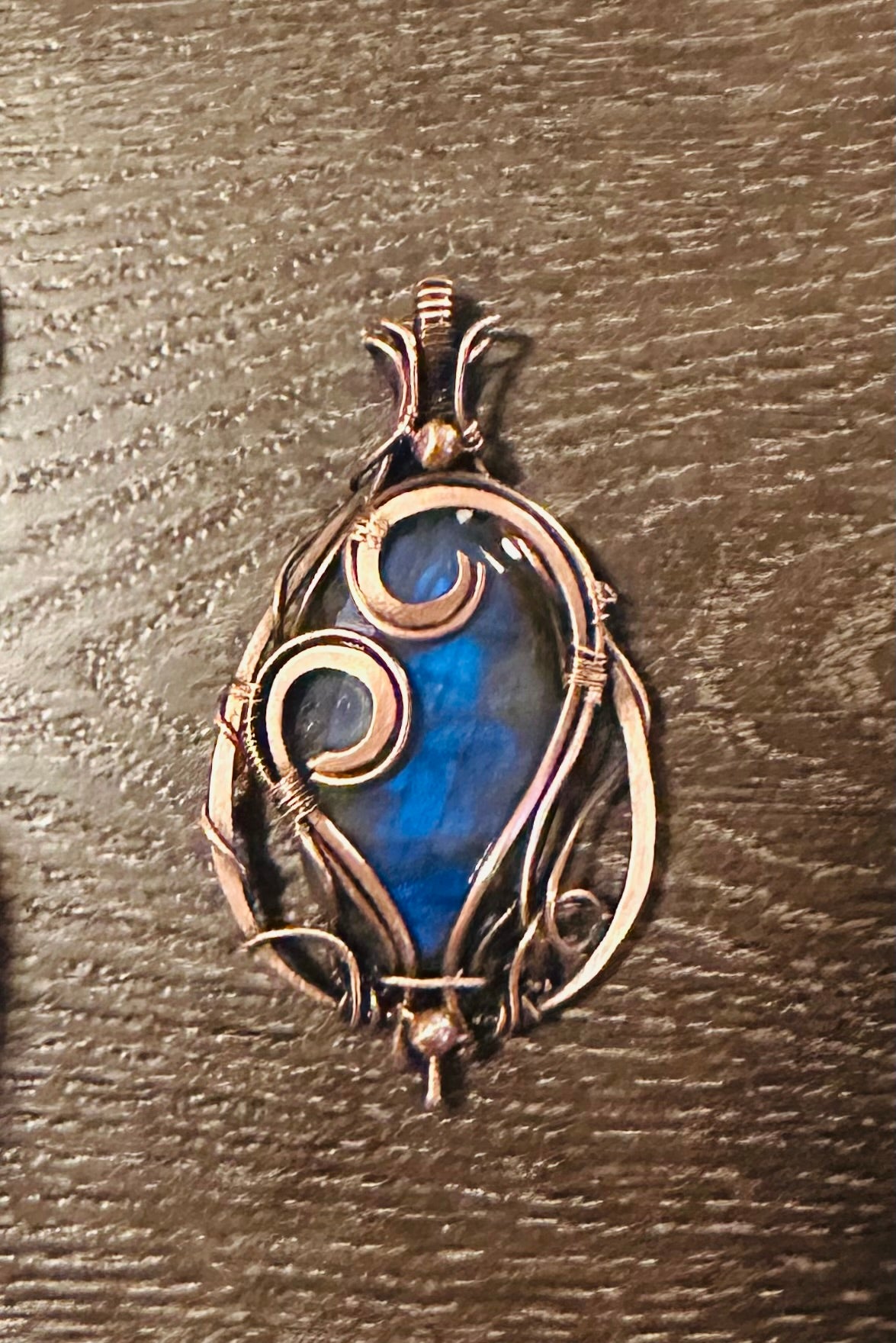 Cobalt blue labradorite copper wrapped pendant necklace.