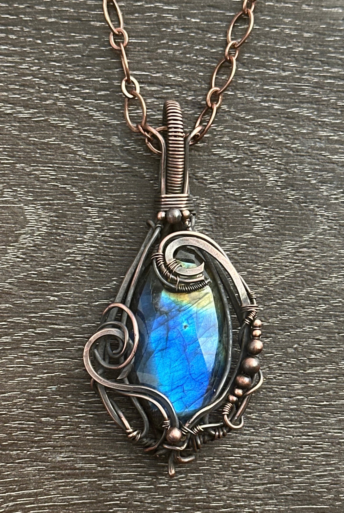 Blue-to-amber labradorite copper wrapped pendant necklace