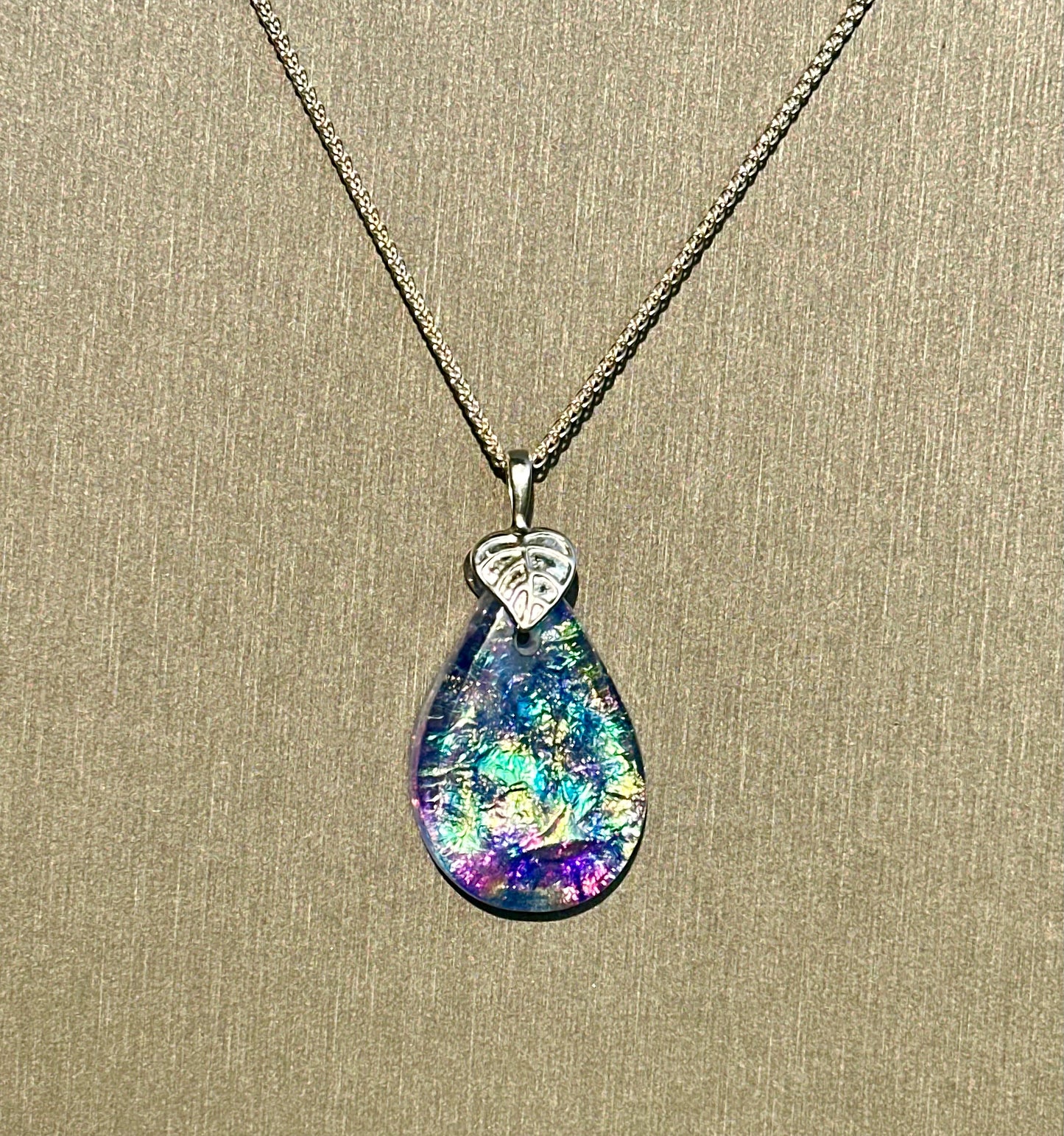 Hand etched and fused opalescent purple multicolor dichroic glass pendant with sterling silver bail and wheat chain.