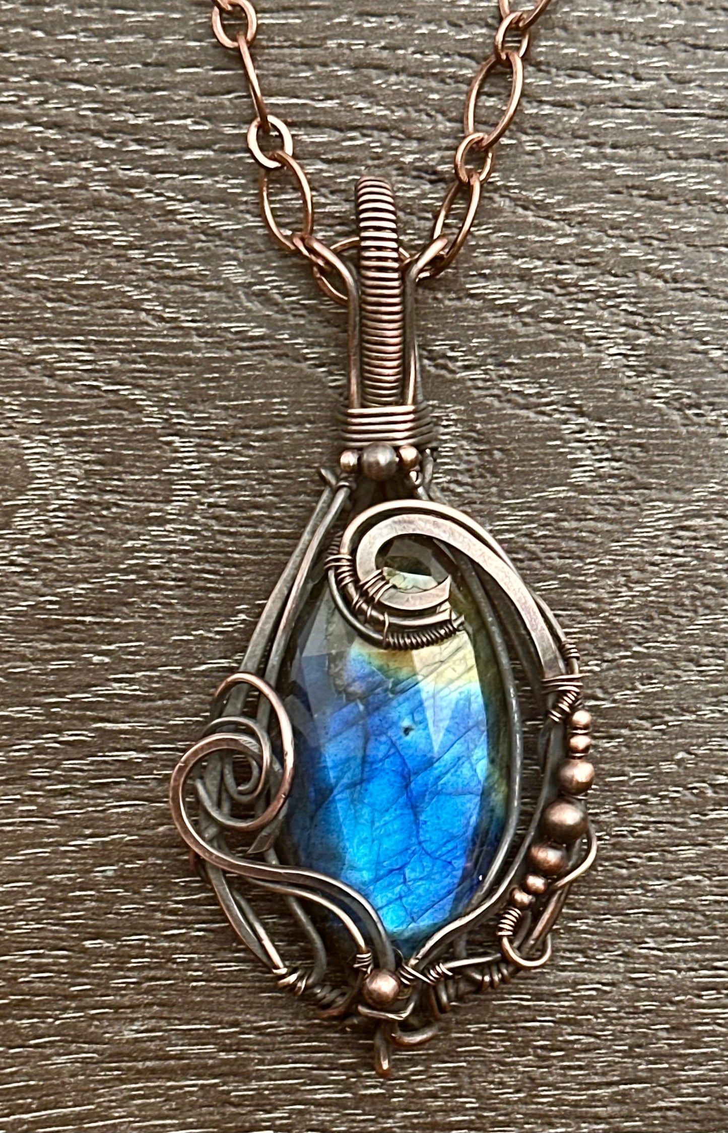 Blue-to-amber labradorite copper wrapped pendant necklace