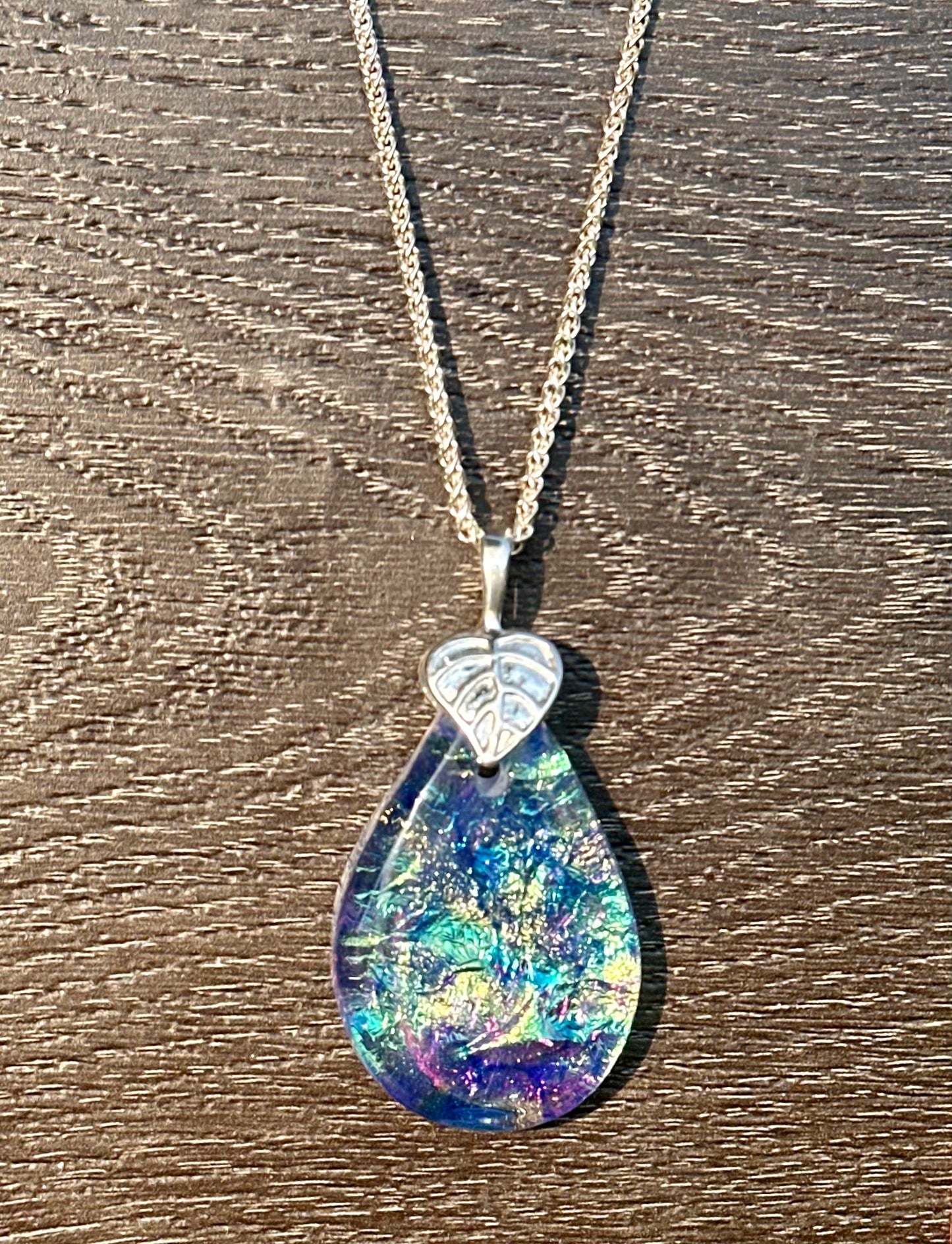 Hand etched and fused opalescent purple multicolor dichroic glass pendant with sterling silver bail and wheat chain.