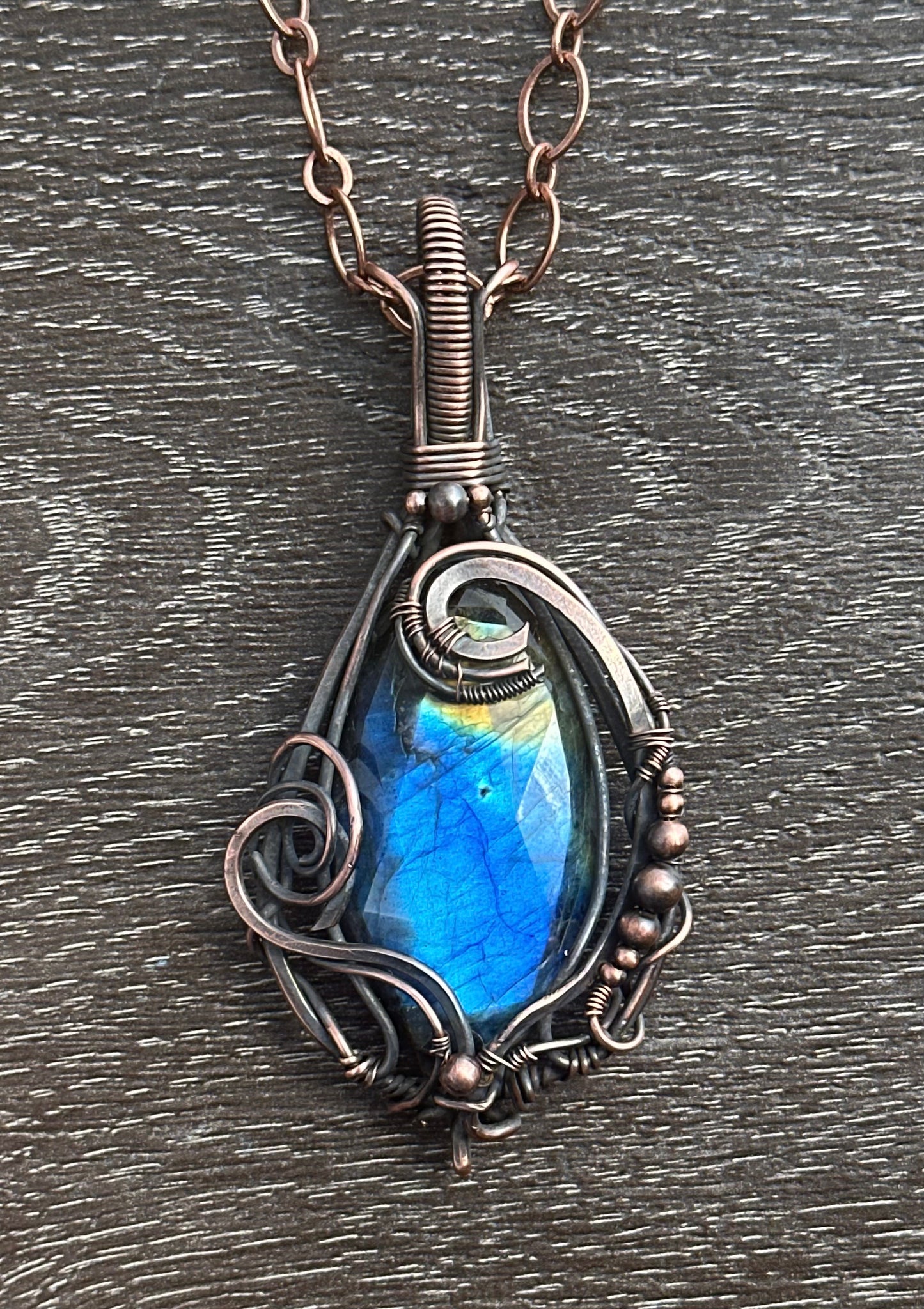 Blue-to-amber labradorite copper wrapped pendant necklace