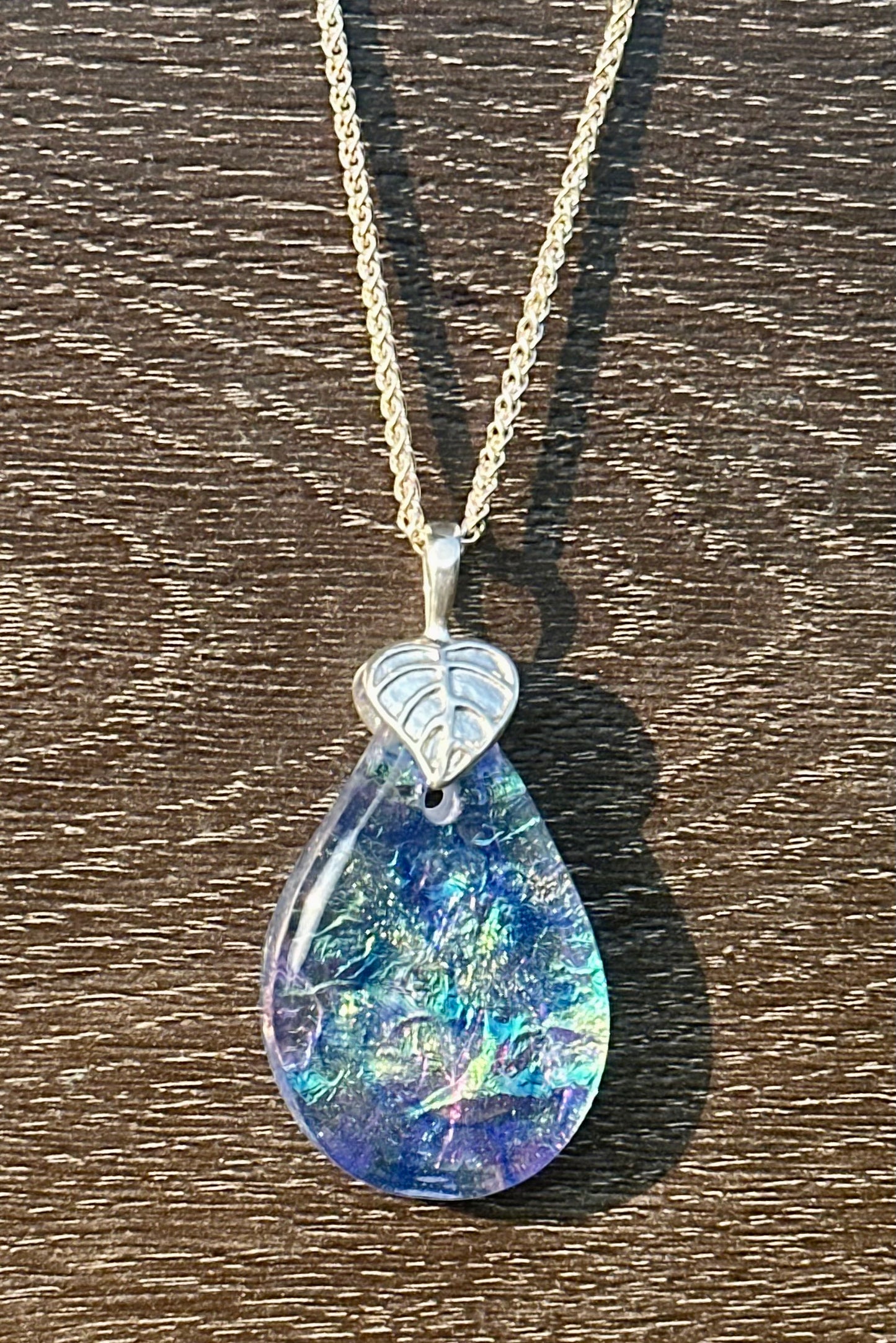 Hand etched and fused opalescent purple multicolor dichroic glass pendant with sterling silver bail and wheat chain.