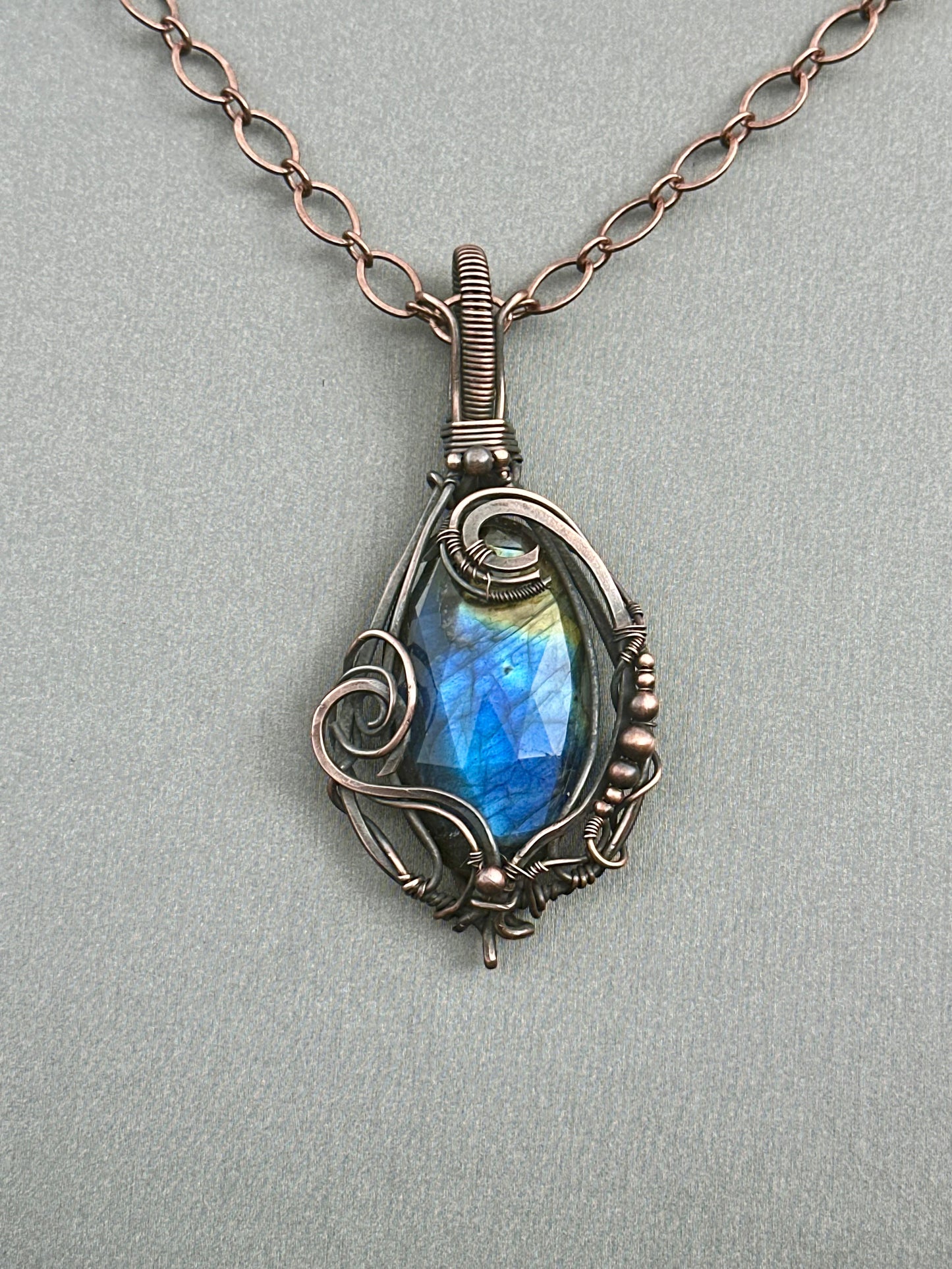 Blue-to-amber labradorite copper wrapped pendant necklace