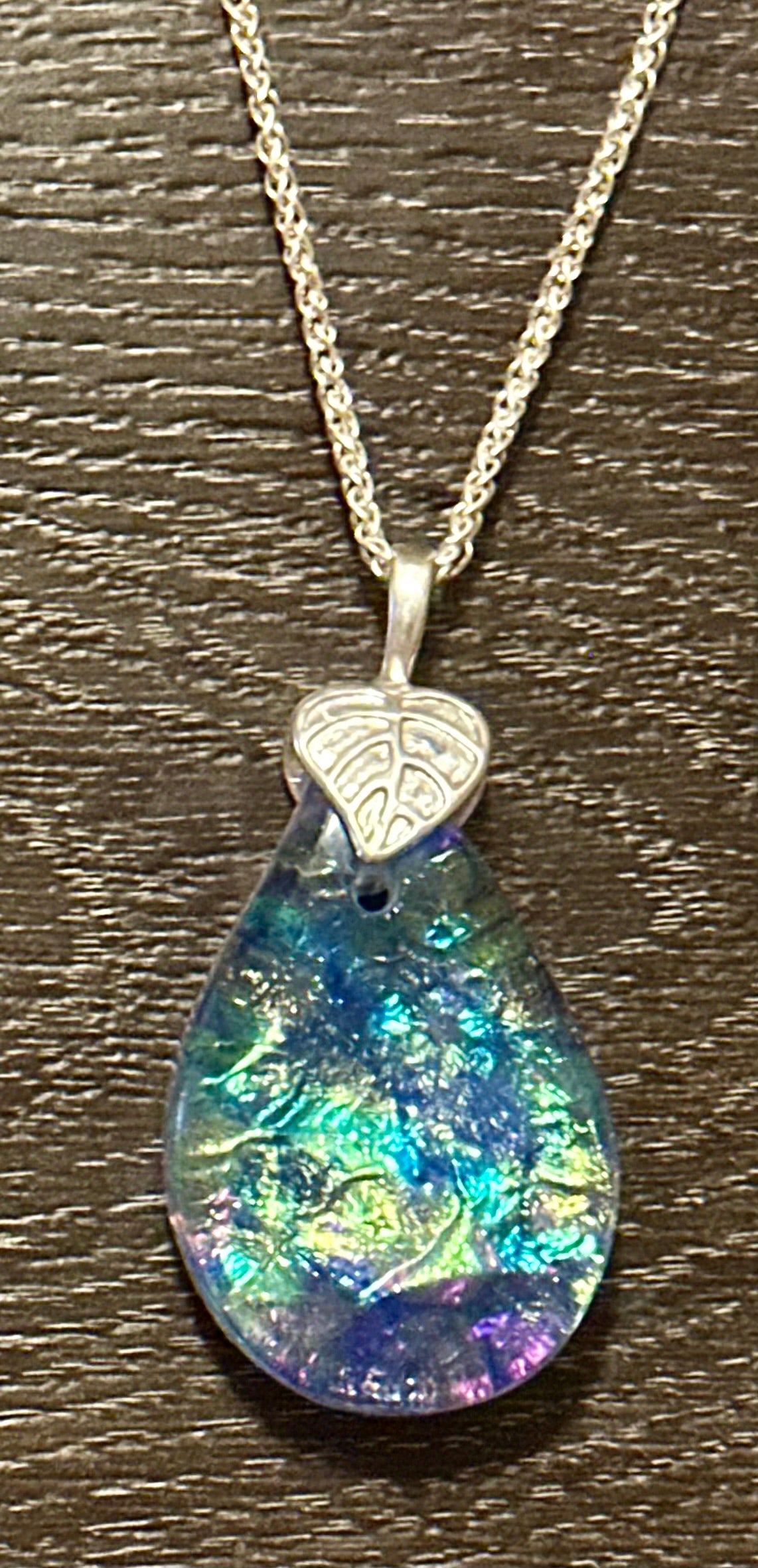 Hand etched and fused opalescent purple multicolor dichroic glass pendant with sterling silver bail and wheat chain.