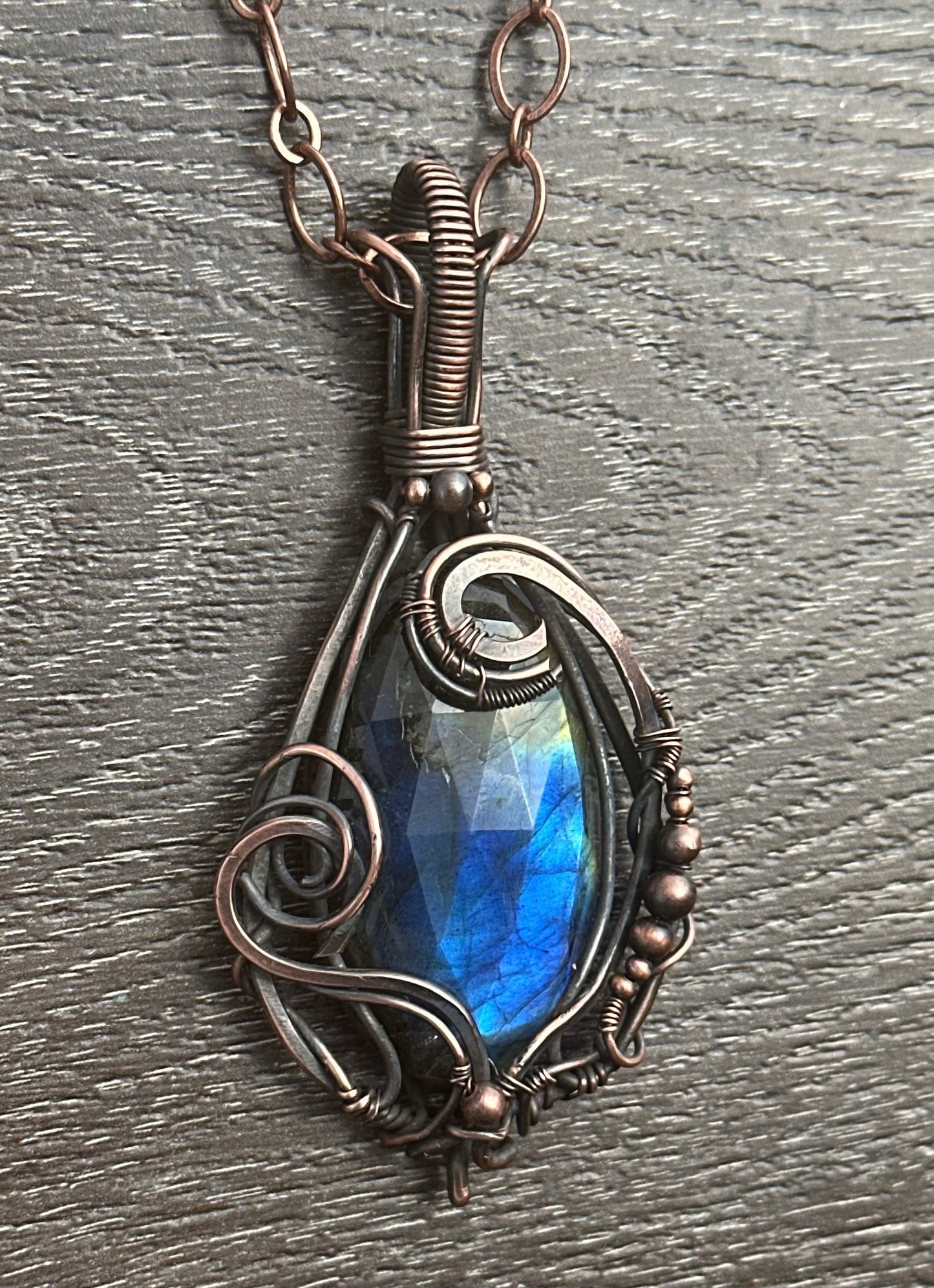 Blue-to-amber labradorite copper wrapped pendant necklace