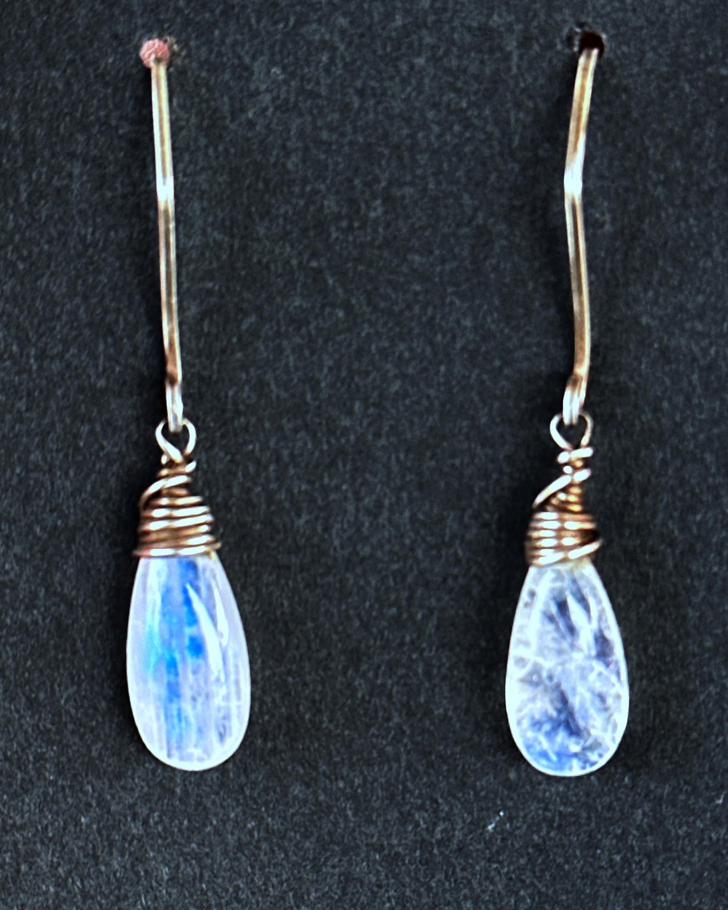 Rainbow moonstone briolette earrings with hand forged sterling silver french hooks.